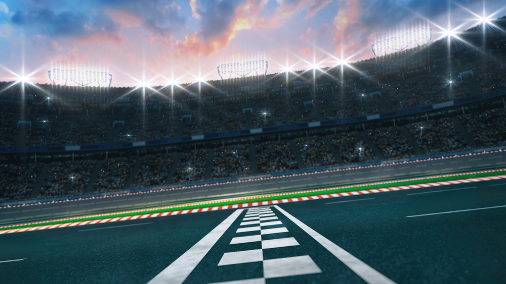 Asphalt,Racing,Track,Finish,Line,Side,View,With,Cheering,Fans